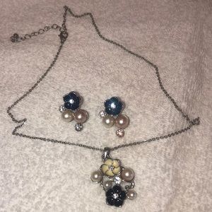 Flower necklace and earrings set in silver, black, pearls and gems